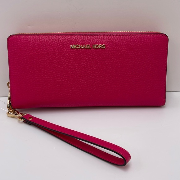 MICHAEL KORS
Leather Continental Wristlet Phone Case Wallet 
Electric Pink 
NWT - Picture 12 of 16
